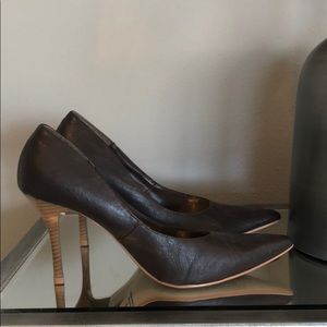 Brown high heeled shoes with faux wood heels